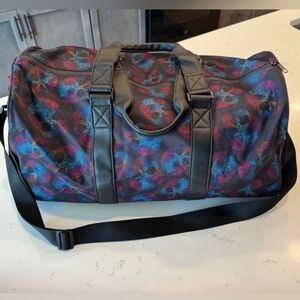 Stylish Black and Multicolor Skull Pattern Duffel Bag